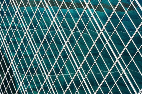 USA, New York, New York City, Windows of office block.