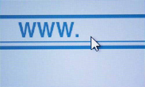Curser by www icon on computer screen.