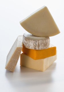 Pieces of different cheese.