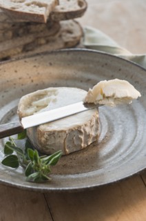 Brie cheese on plate.