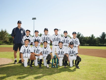 USA, California, Ladera Ranch, portrait of little league players (aged 10-11).