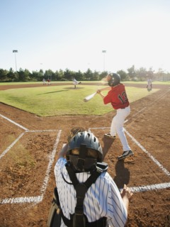 USA, California, little league baseball team (10-11) during baseball match.