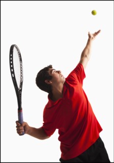 Young man playing tenni