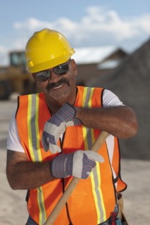 Portrait of construction worker on building site. Photo : Dan Bannister