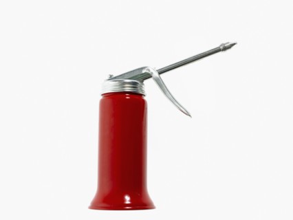 Studio shot of red oil can. Photo : David Arky