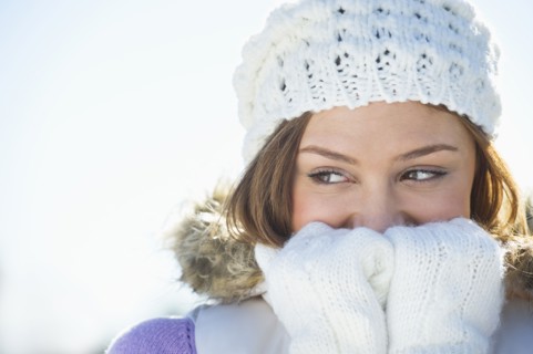 USA, New Jersey, Jersey City, Portrait of young woman wearing white knitted hat.