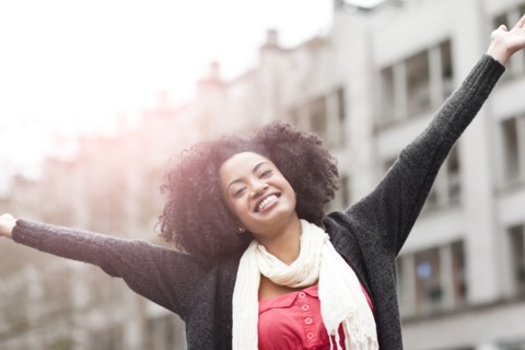 USA, Washington State, Seattle, Portrait of enthusiastic young woman. Photo : Take A Pix Media