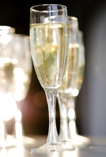 Close up of champagne flutes. Photo : Jamie Grill Photography