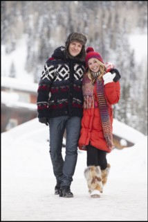 USA, Utah, Salt Lake City, Portrait of young couple walking in snow. Photo : Mike Kemp