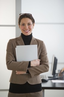 Portrait of young woman in office.