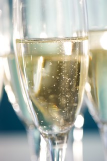 Close up of champagne flutes. Photo : Jamie Grill Photography