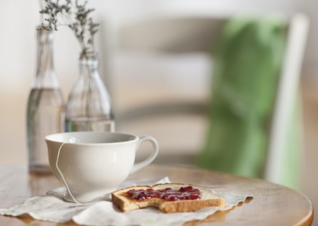 Cup of tea and toast with marmalade.
