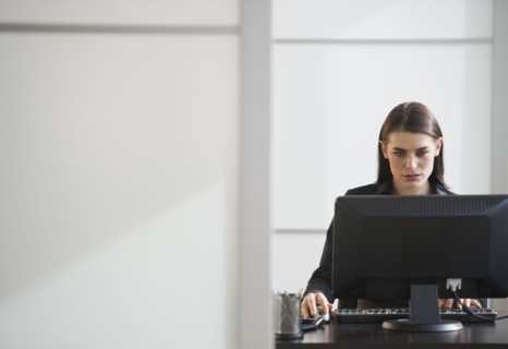 Businesswoman working in office.