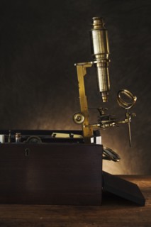 Close up of antique microscope.