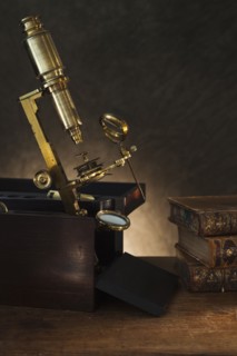 Close up of antique microscope.