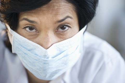 Portrait of mature woman wearing protection mask.