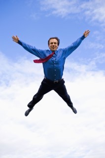 Businessman mid-air. Photo : Noah Clayton