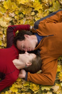 USA, Montana, Kalispell, Happy couple embracing in autumn. Photo : Noah Clayton