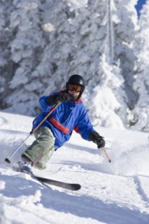 USA, Montana, Whitefish, Male skier on mountain slope. Photo : Noah Clayton