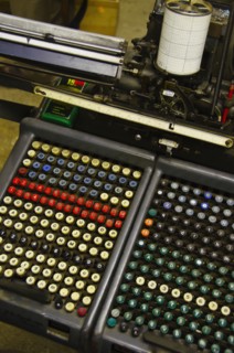 Close up of push buttons from printing press.