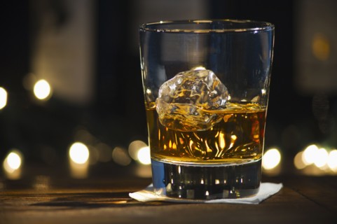 Close-up view of bourbon on bar counter.