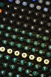 Close up of push buttons from printing press.