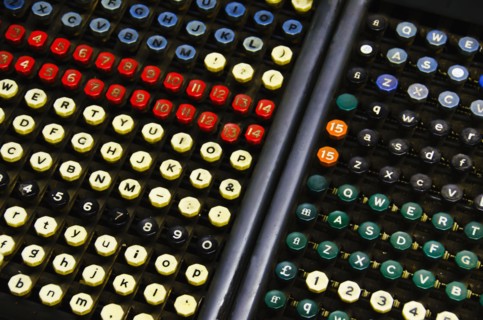 Close up of push buttons from printing press.