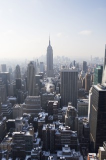 USA, New York City, View of Manhattan covered with snow, with Empire State Building in background.