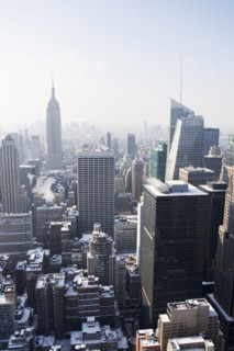 USA, New York City, View of Manhattan covered with snow, with Empire State Building in background.