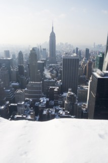 USA, New York City, View of Manhattan covered with snow, with Empire State Building in background.