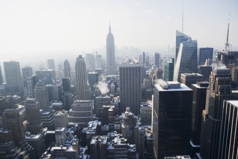 USA, New York City, View of Manhattan covered with snow, with Empire State Building in background.