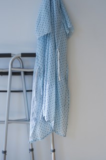 Walking frame and patients gown in hospital.