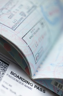Passport with boarding pass inside.