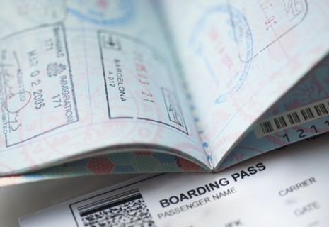 Passport with boarding pass inside.