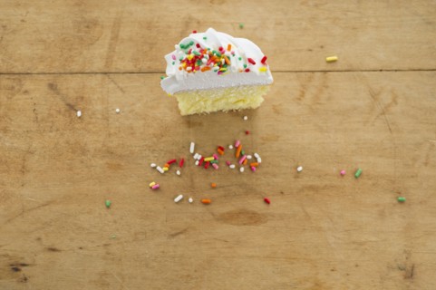 Homemade cupcake with missing bite.