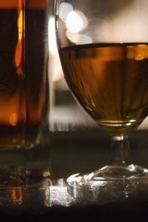 Beer in glasses on bar.