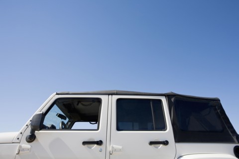 USA, Massachusetts, close up of jeep against blue sky. Photo : Chris Hackett