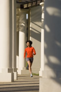 USA, California, Oakland, Young woman jogging. Photo : Noah Clayton