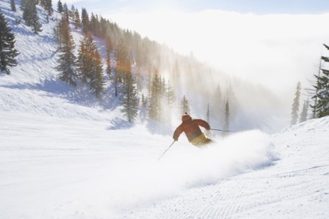 USA, Montana, Whitefish, Male skier on mountain slope. Photo : Noah Clayton