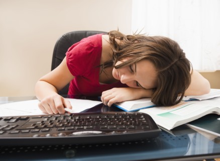 Young woman studying. Photo : Mike Kemp