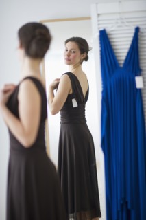Woman fitting new dress.