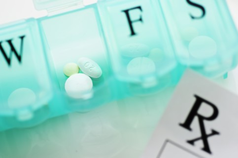 Close up of pill container.