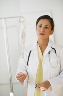 Female doctor with IV drip.