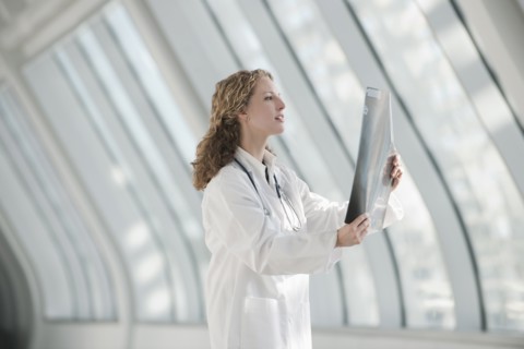 Doctor examining x-ray. Photo : Mark Edward Atkinson