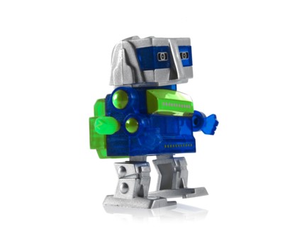 Toy robot on white background. Photo : David Arky