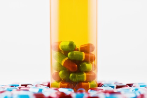 Studio shot of capsules and pill bottle. Photo : Antonio M. Rosario