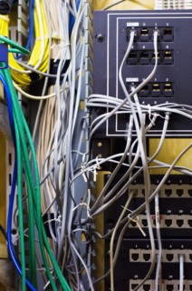 Close-up of tangled computer cables. Photo : Antonio M. Rosario