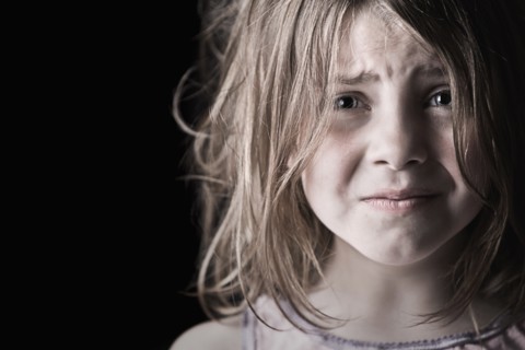 Studio portrait of girl (6-7). Photo: Justin Paget
