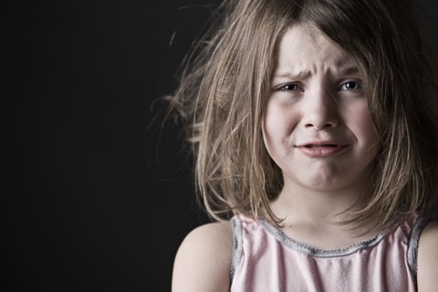 Studio portrait of girl (6-7). Photo: Justin Paget