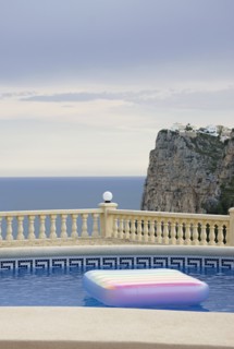 Air Mattress on Swimming Pool in the Evening
